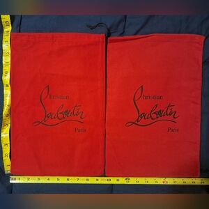 Two Christian Louboutin dust bags